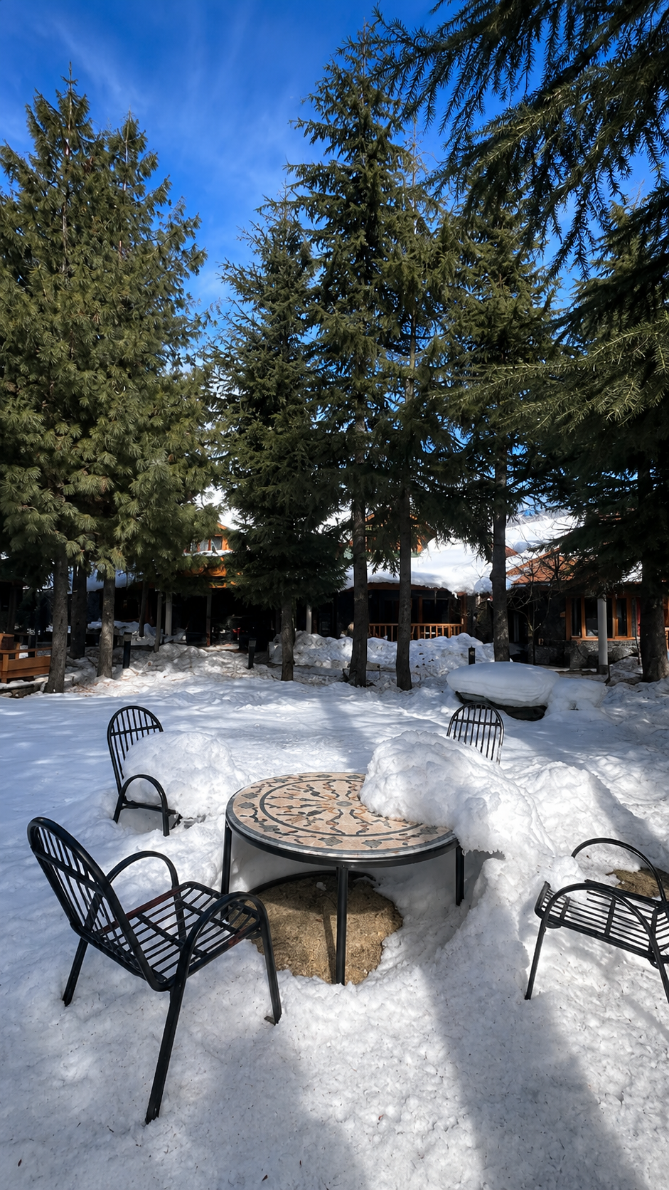 Snowy garden seating at Secret Garden Kalam